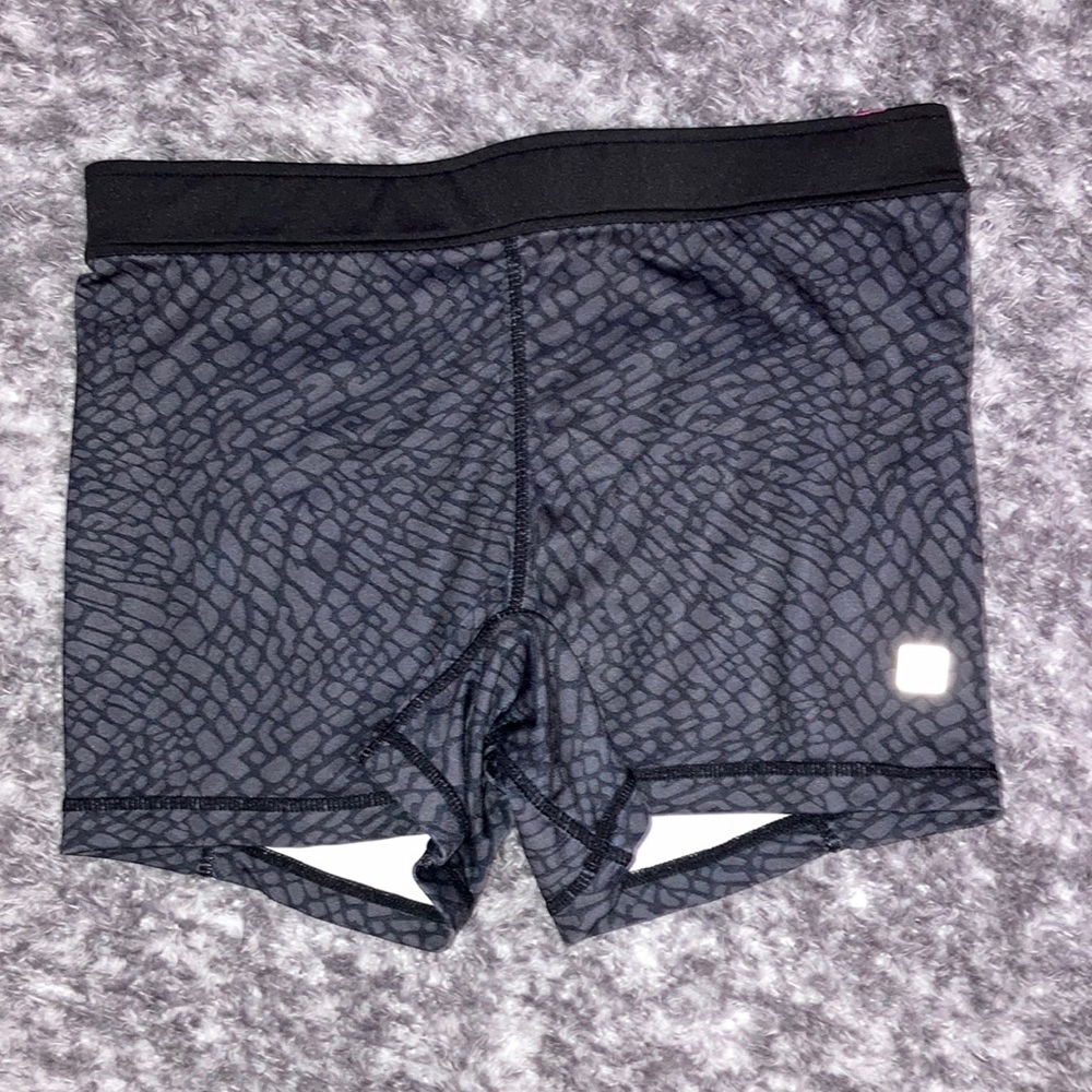Hind spandex, color gray and black, woman’s size medium